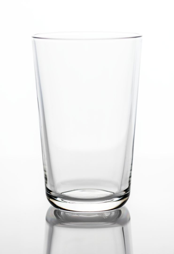 Empty Glassware on Reflective Surface with Copy Space