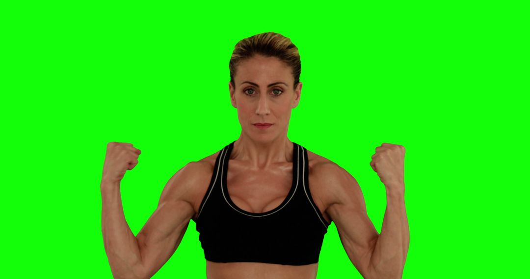 Strong Woman Flexing Biceps on Green Screen Background - Free Images, Stock Photos and Pictures on Pikwizard.com