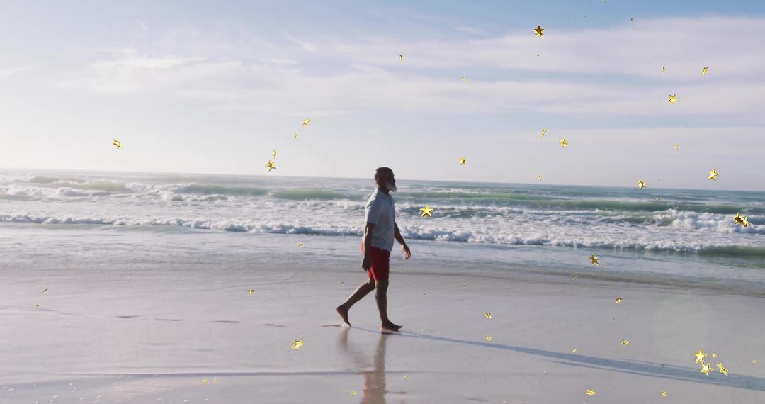 Person Strolling on Serene Beach with Reflective Wet Sand
