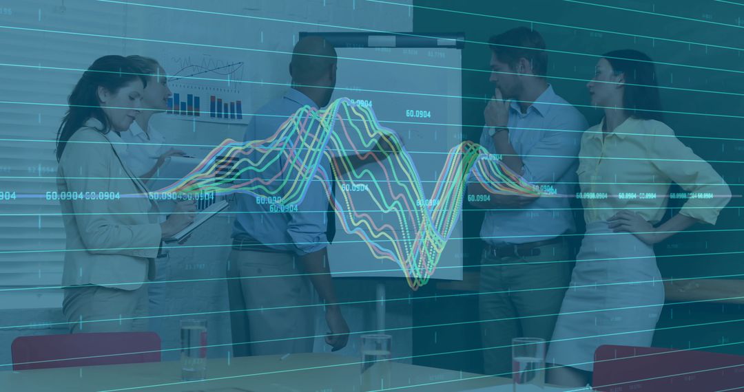 Business Team Analyzing Data with Overlaid Line Graphs