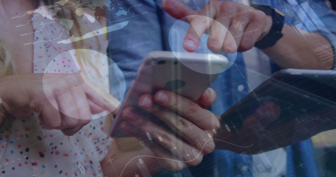 Team Collaborating on Mobile and Tablet Technology Interaction