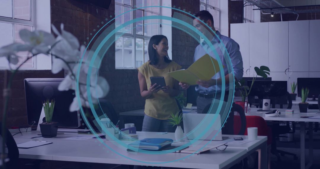 Modern Workspace Collaboration Between Colleagues in Open-Plan Office