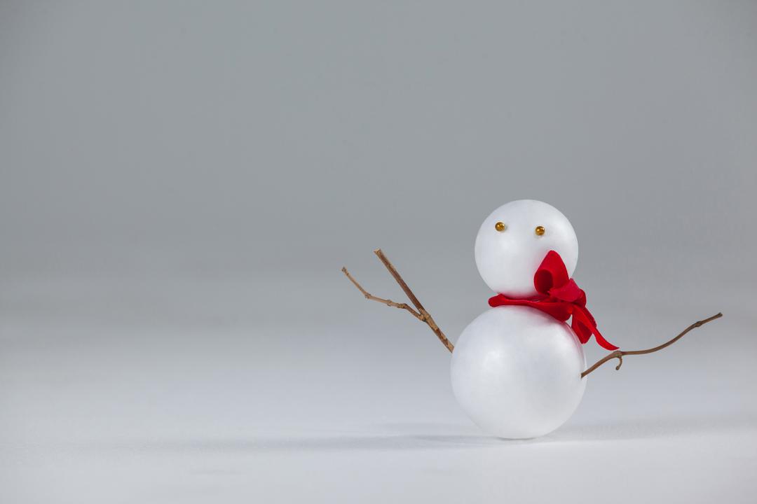 Minimalist Christmas Snowman Ornament with Red Scarf - Free Images, Stock Photos and Pictures on Pikwizard.com