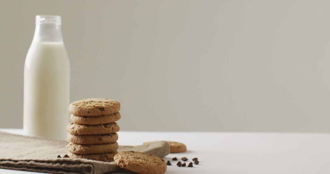 Image of biscuits with chocolate and milk on white background - Free Images, Stock Photos and Pictures on Pikwizard.com