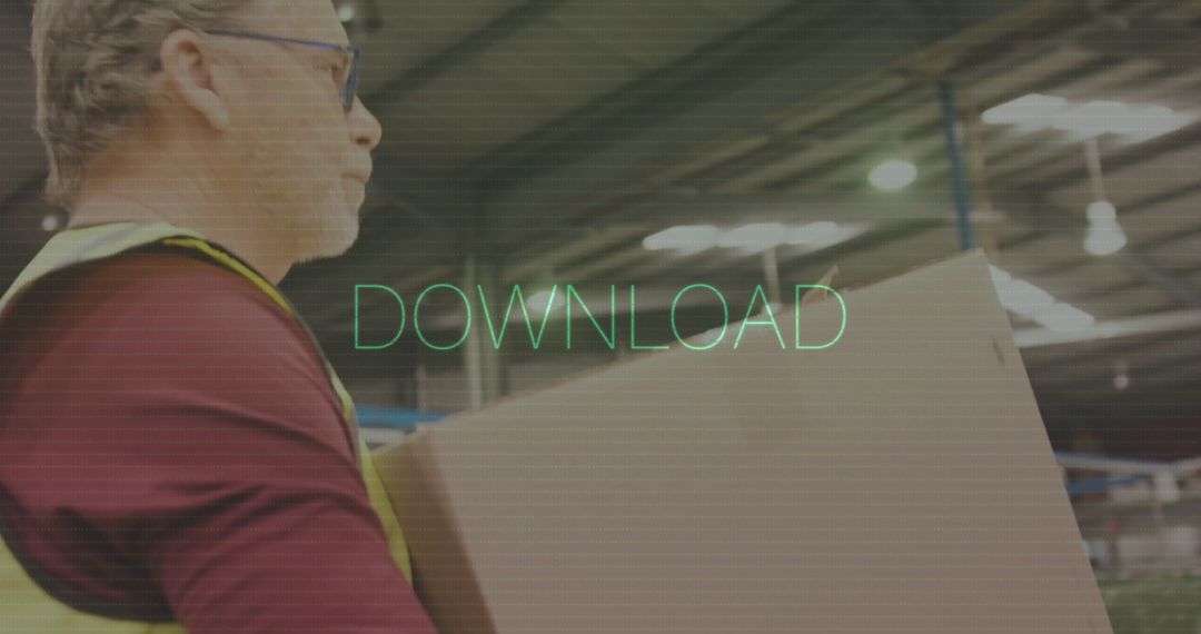 Warehouse Worker Carrying Box in Industrial Setting