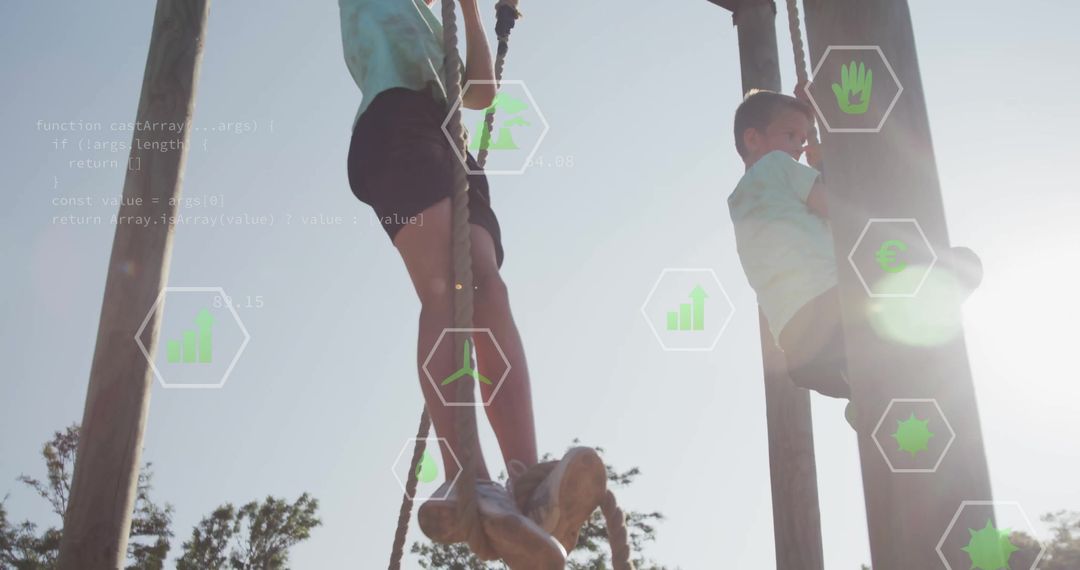 Boys Climbing Ropes at Park with Digital Data Overlay