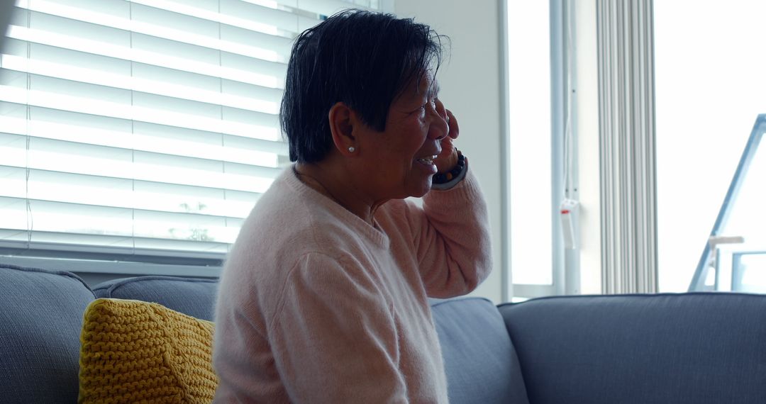 Older Woman Talking on Phone at Home - Free Images, Stock Photos and Pictures on Pikwizard.com