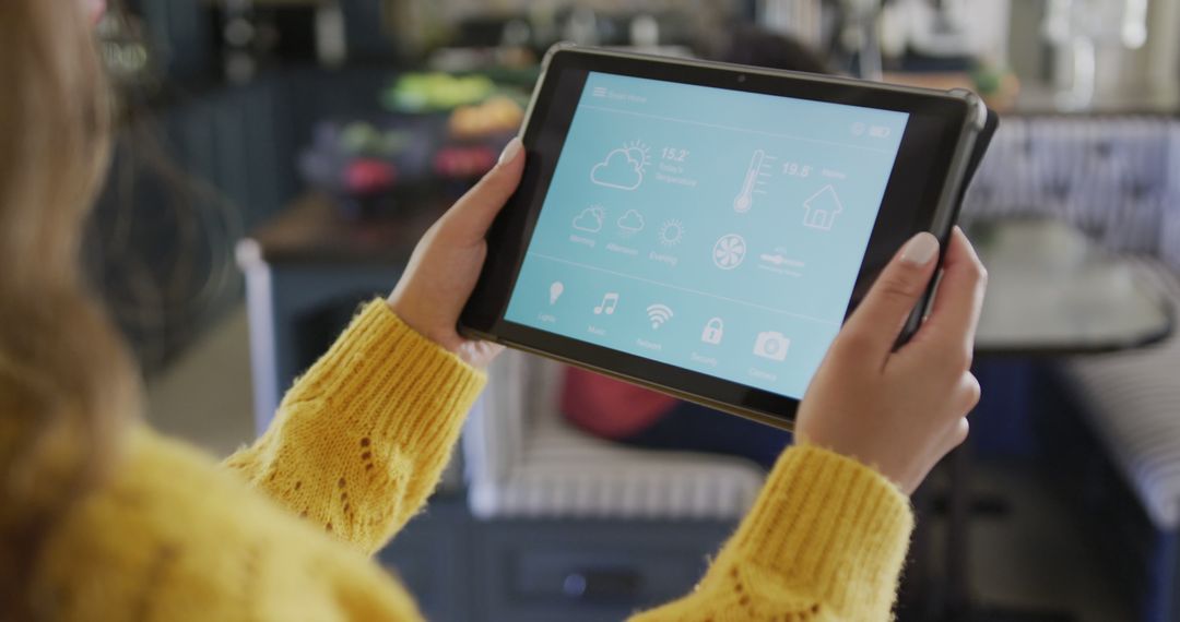 Person Controlling Smart Home Devices Using Tablet - Free Images, Stock Photos and Pictures on Pikwizard.com