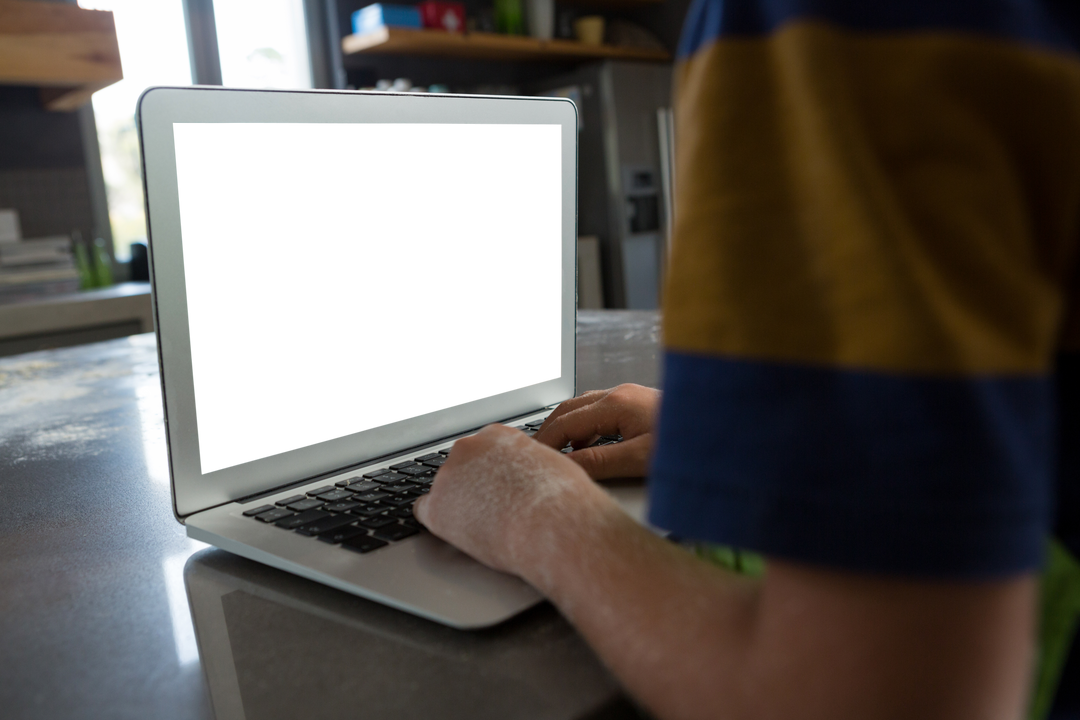 Boy Using Transparent Laptop in Modern Kitchen - Download Free Stock Images Pikwizard.com