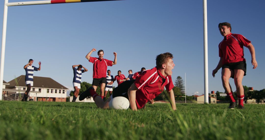 Rugby Team Scoring Triumph Celebration on Field - Free Images, Stock Photos and Pictures on Pikwizard.com