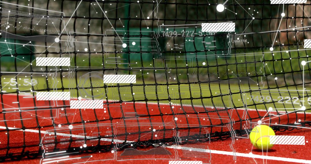 Yellow tennis ball resting by net on red hard court with HUD overlay for sports analytics