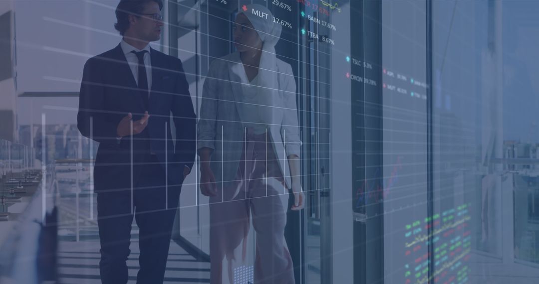 Colleagues Analyzing Financial Data on Transparent Digital Screen