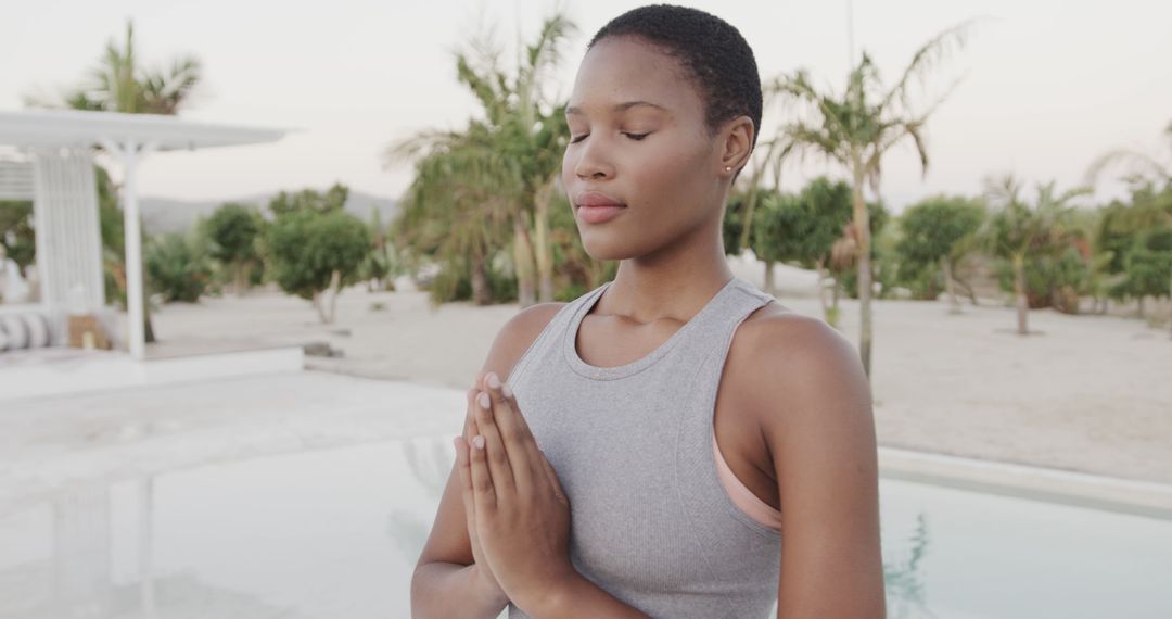 Meditating Woman Practicing Yoga Outdoors in Serene Environment - Free Images, Stock Photos and Pictures on Pikwizard.com