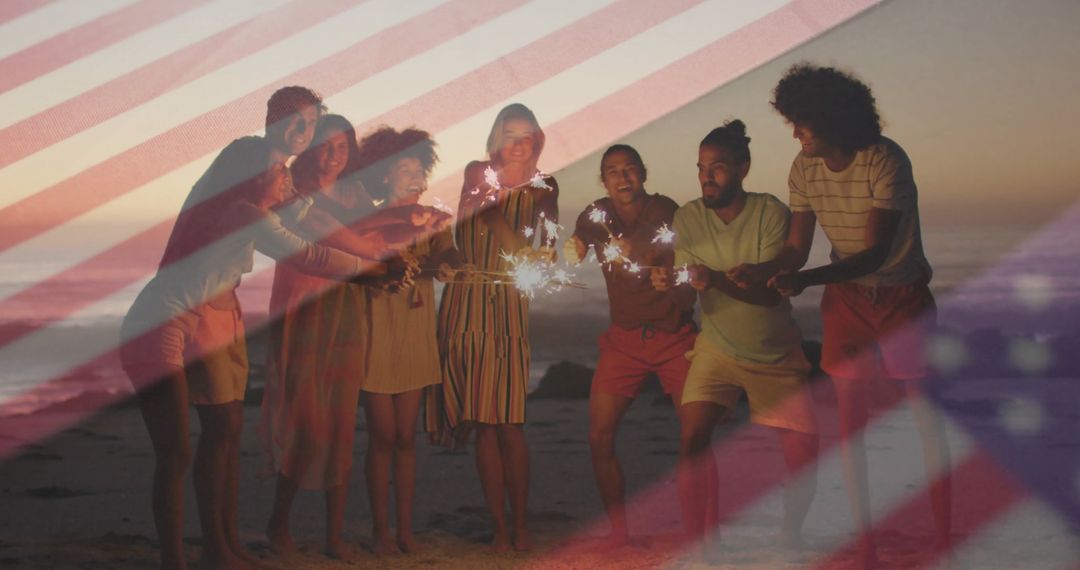 Friends Celebrating With Sparklers on Sunny Beach at Sunset
