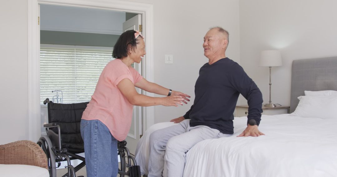 Senior Asian Couple Caring and Supporting Each Other at Home