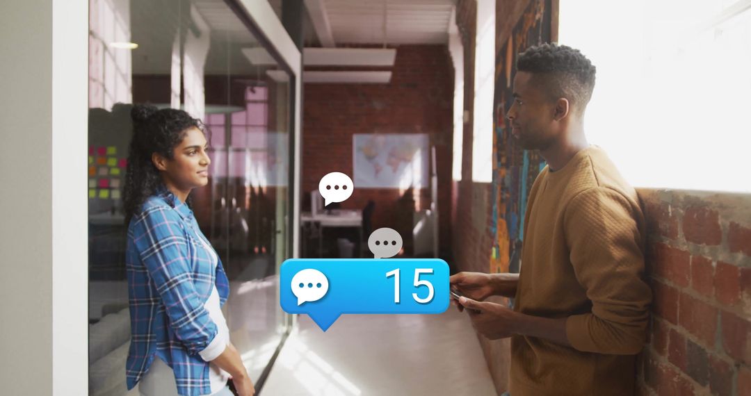 Contemporary Colleagues Engaged in Digital Communication at Office