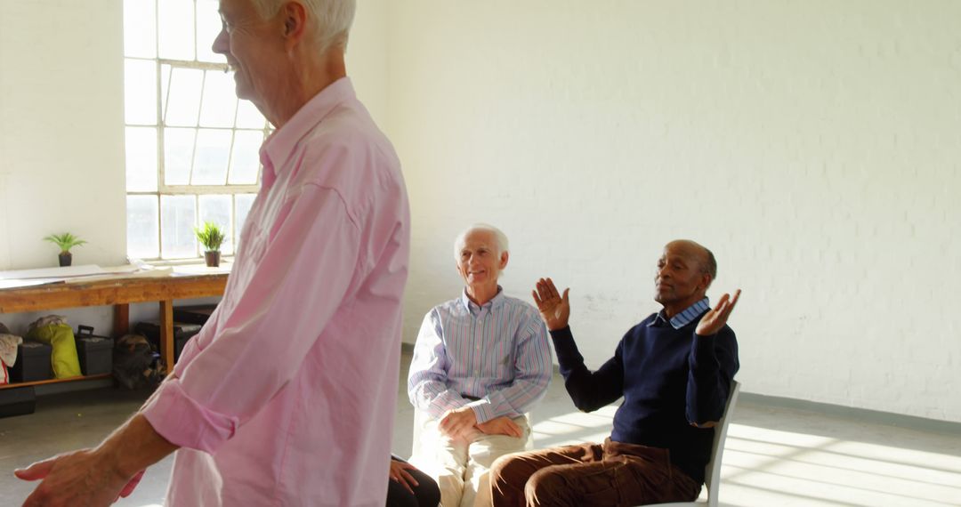 Senior Group Enjoying Activity in Bright Room - Free Images, Stock Photos and Pictures on Pikwizard.com