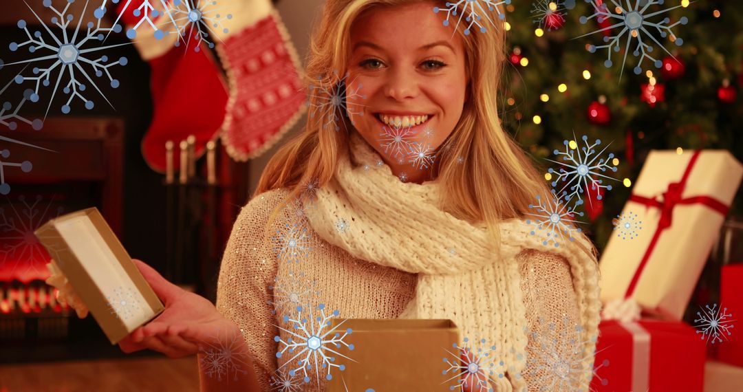 Smiling Woman with Christmas Gifts and Snowflakes