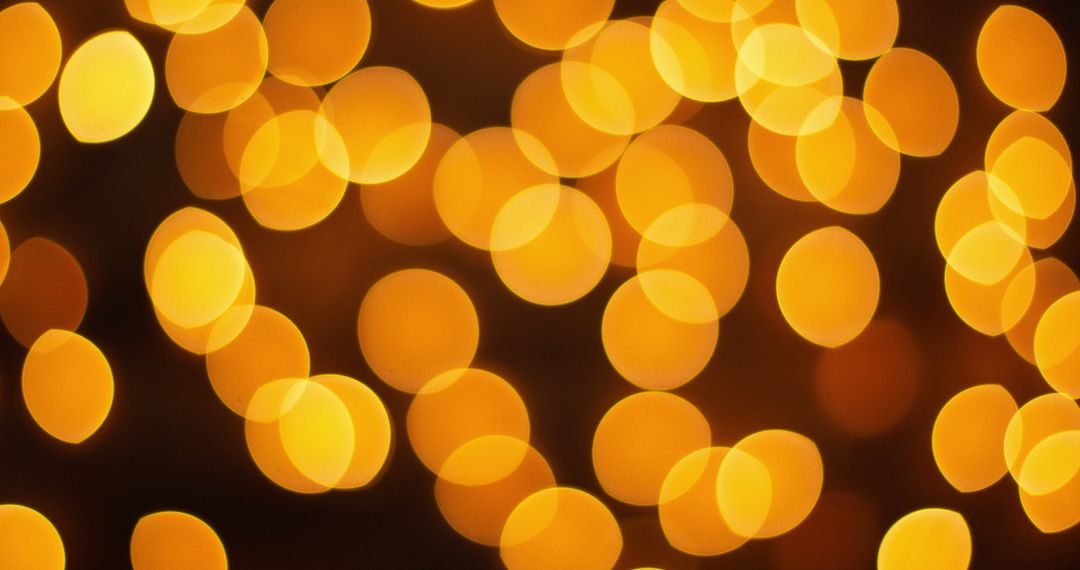 Warm Yellow Bokeh Lights on Black Background