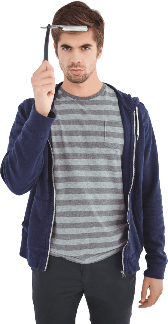 Young Man Holding Straight Razor with Serious Expression