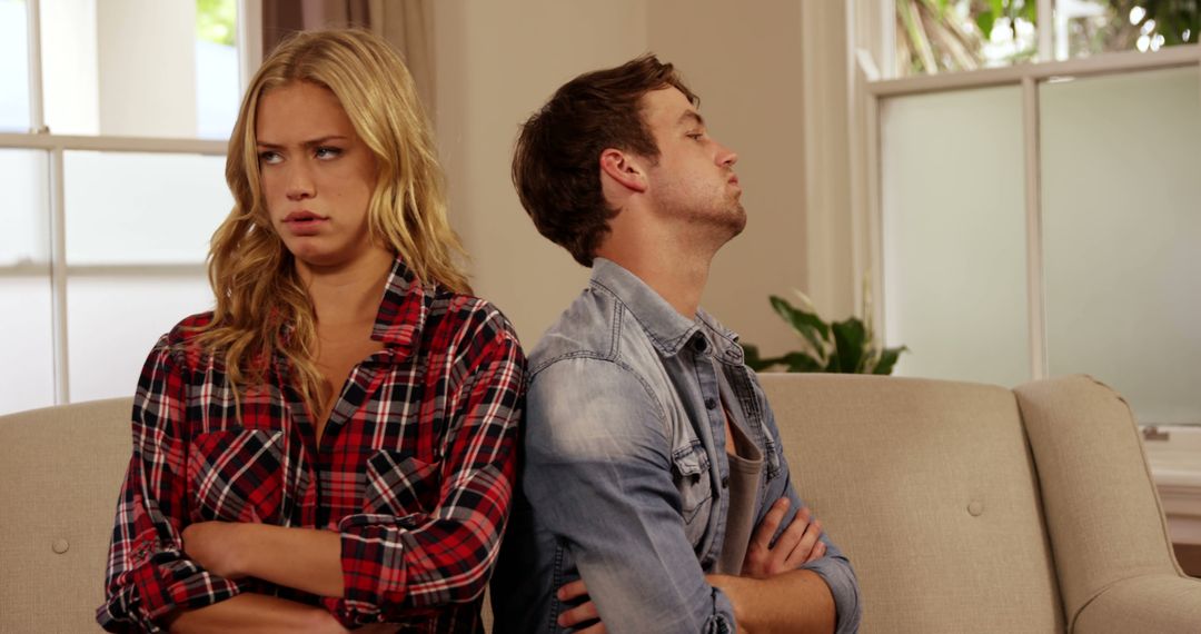 Young Couple Having Tense Argument at Home