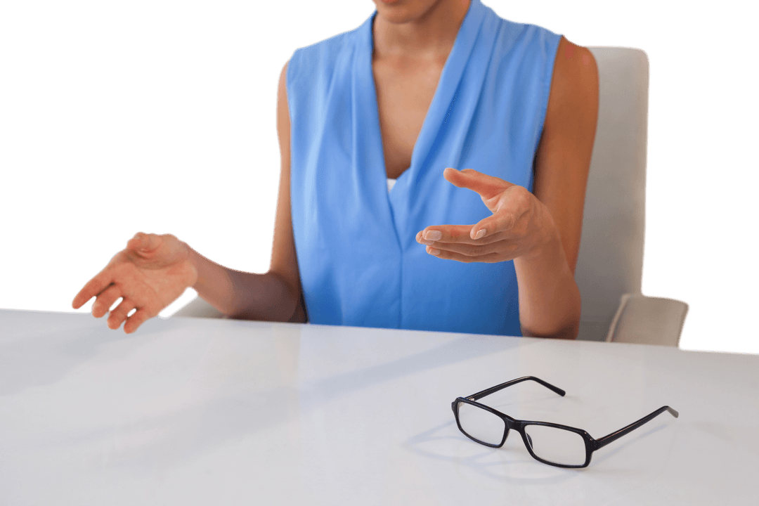 Businesswoman Transparently Gesturing Over Table in Discussion