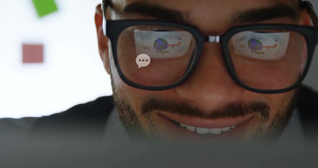 Businessman Analyzing Data with Reflections on Glasses