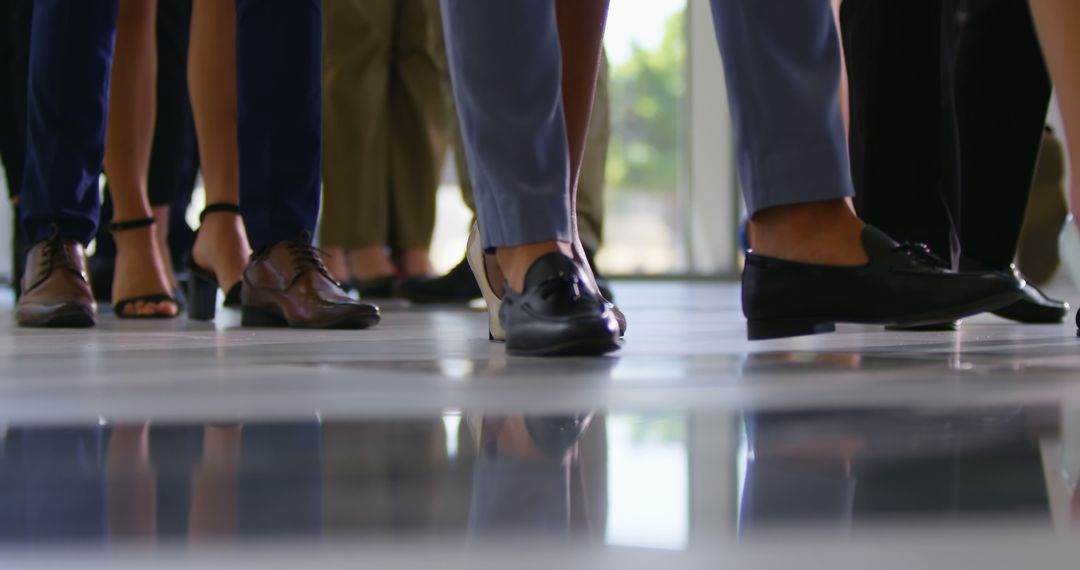 Business Professionals Feet Seen Walking in Office Lobby - Free Images, Stock Photos and Pictures on Pikwizard.com