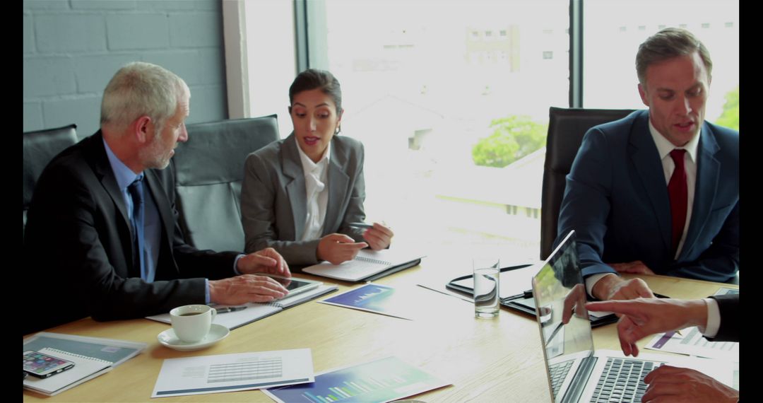 Business Team Collaborating During a Meeting - Free Images, Stock Photos and Pictures on Pikwizard.com