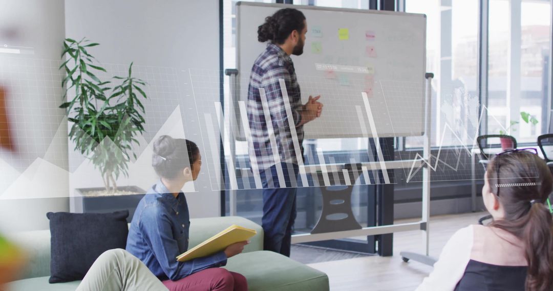 Diverse Team Collaborating on Data-Driven Analysis in Modern Office