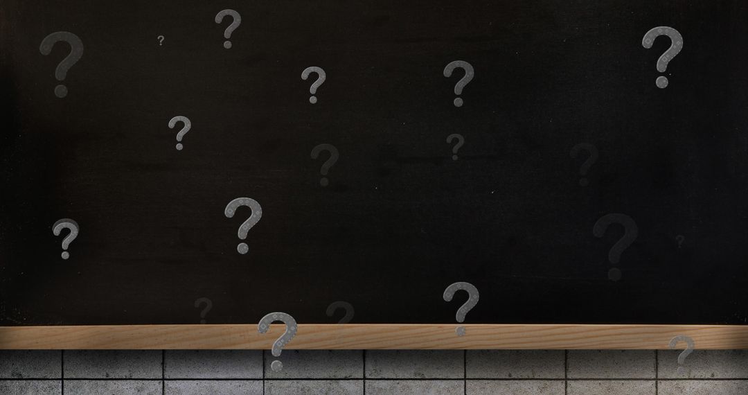 Mystery and Questions Concept on Blank Blackboard