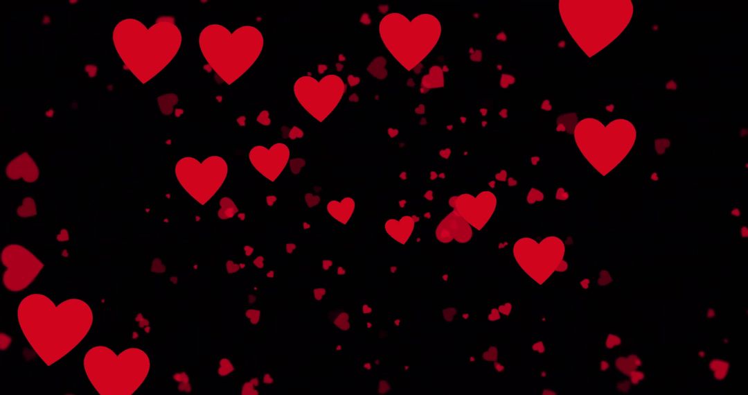 Vibrant Red Hearts Floating on Dark Background