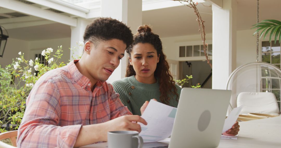 Couple Managing Finances Together at Home with Laptop - Free Images, Stock Photos and Pictures on Pikwizard.com