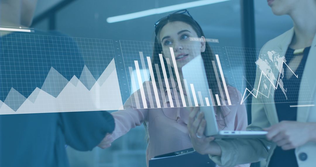 Business Colleagues Handshaking with Data Interface Overlay