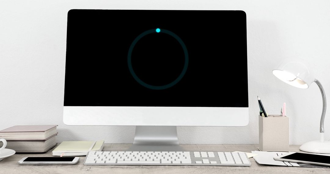 Modern Office Desk with Loading Screen Computer - Free Images, Stock Photos and Pictures on Pikwizard.com