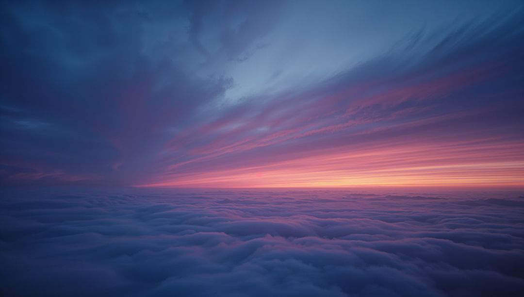 Ethereal Cloudscape with Vibrant Sunset Sky Gradient