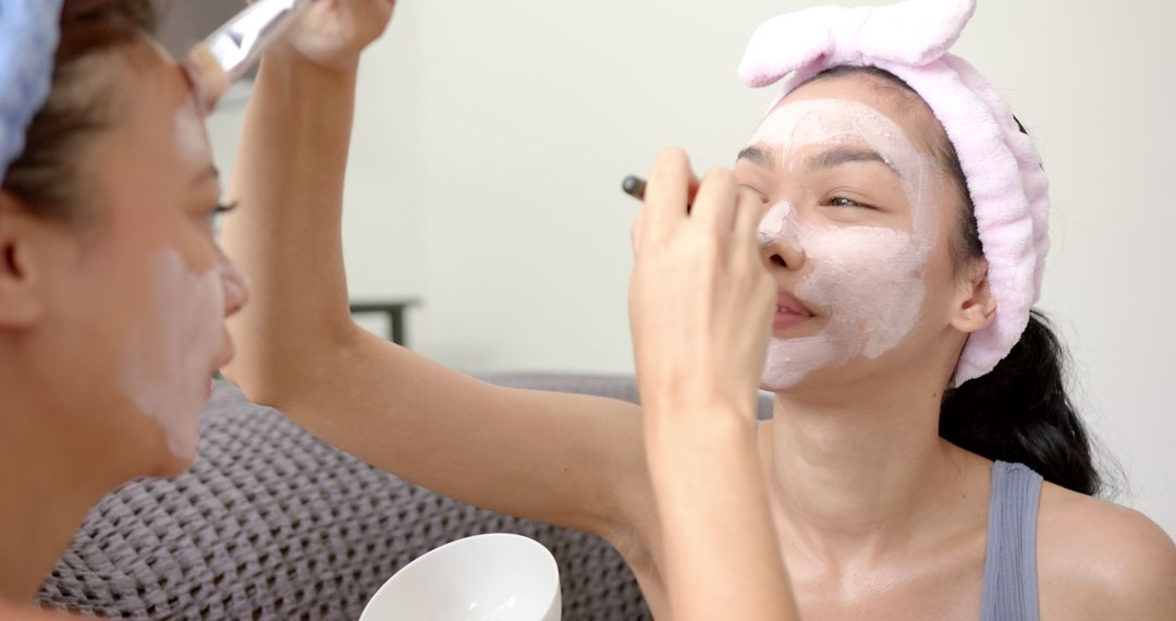 Friends Enjoying Skincare Routine with Facial Masks