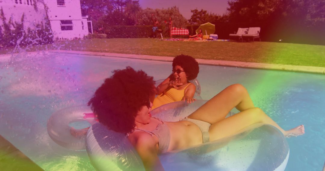 Friends Relaxing on Pool Floats in Vibrant Summertime Scene
