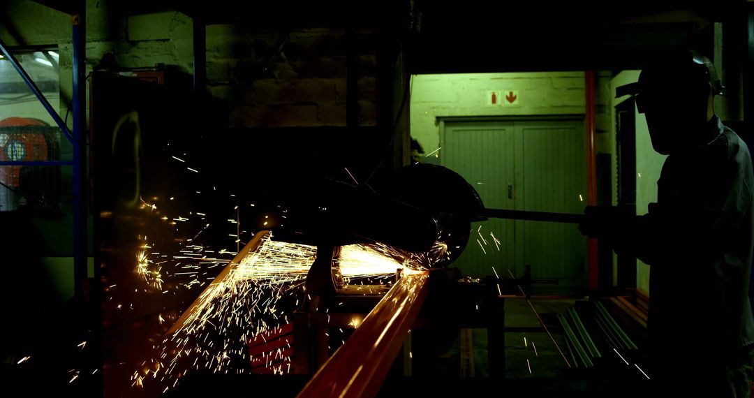 The photo depicts the skilled intensity of industrial metalworking with a grinder's spark shower. - Free Images, Stock Photos and Pictures on Pikwizard.com