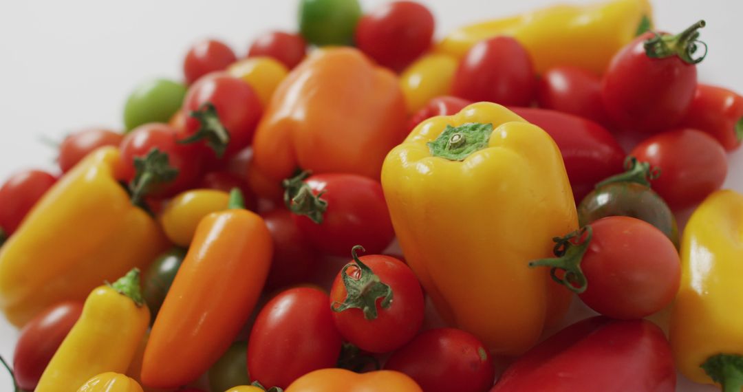 Assortment of Fresh Multicolored Tomatoes and Peppers