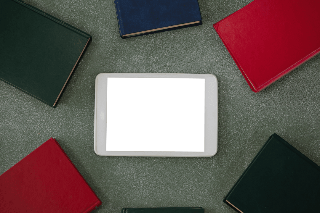 Digital Tablet Transparent Screen on Chalkboard with Organizers Around