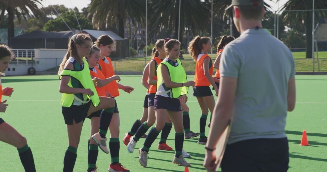 Young Girls Participating in Field Hockey Practice Session - Free Images, Stock Photos and Pictures on Pikwizard.com