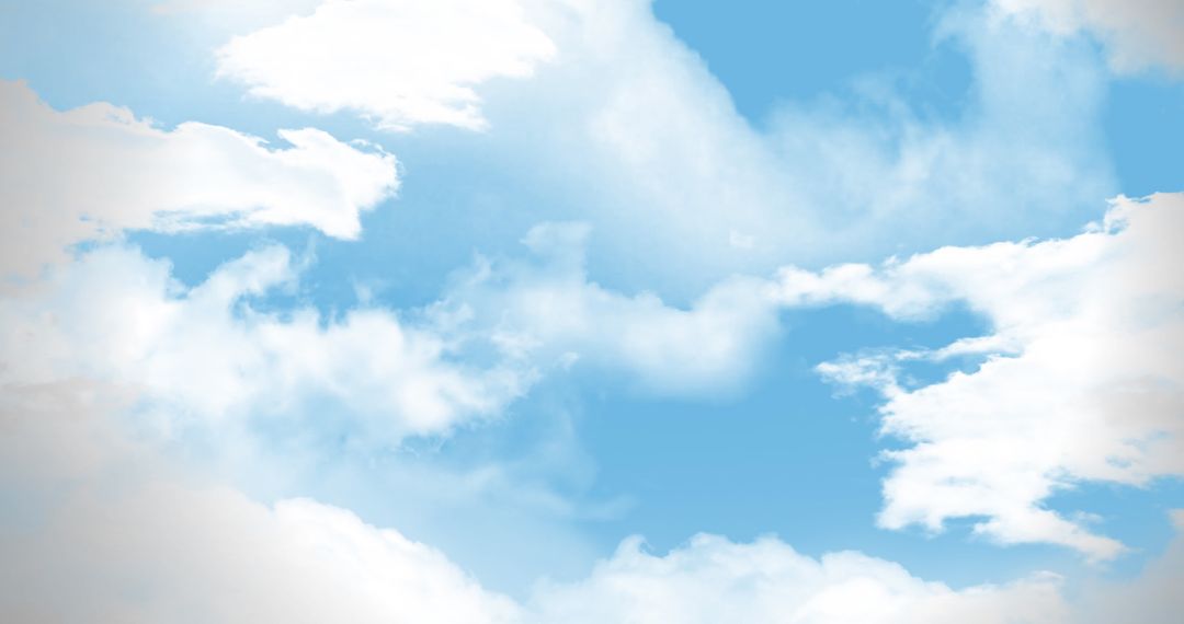 Tranquil Blue Sky with Fluffy White Clouds in Daytime