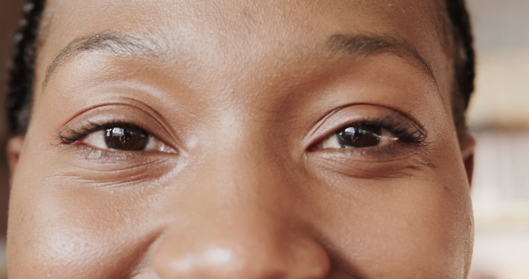 Close-Up of African American Woman's Eyes with Playful Expression - Free Images, Stock Photos and Pictures on Pikwizard.com