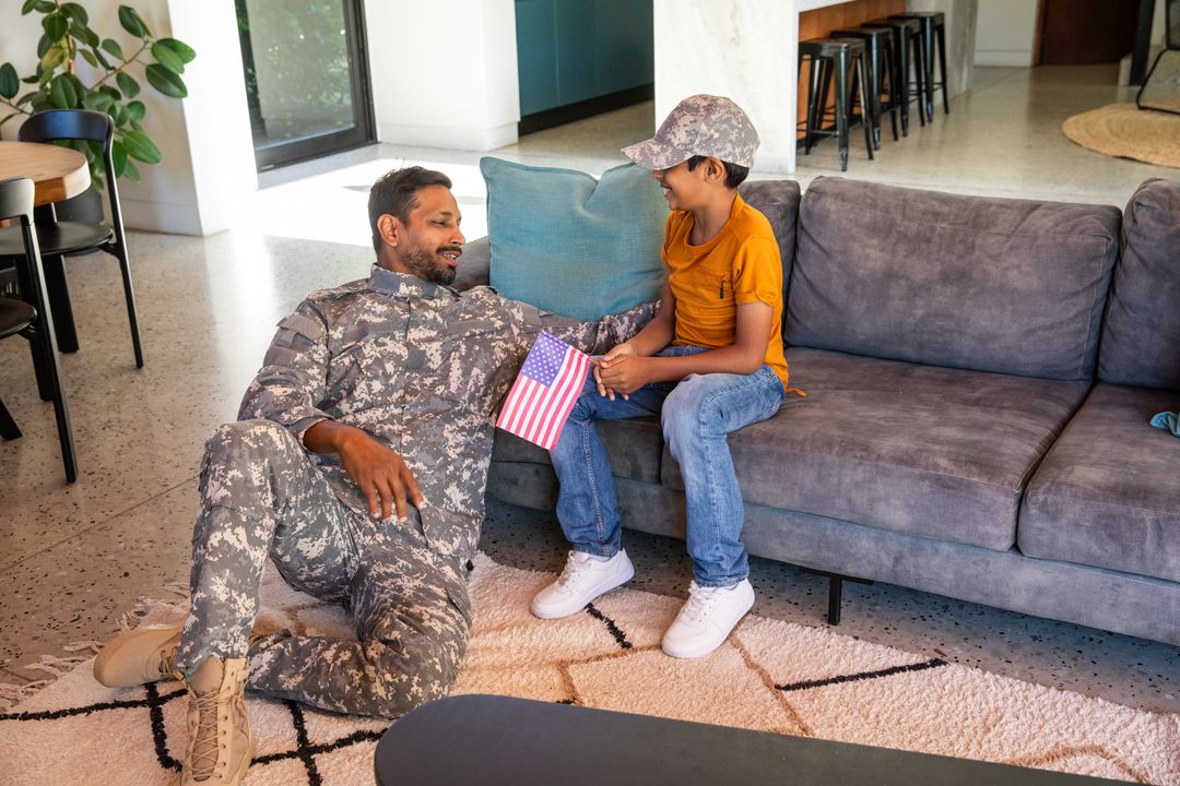 Father and Son Bonding Time with American Flag at Home