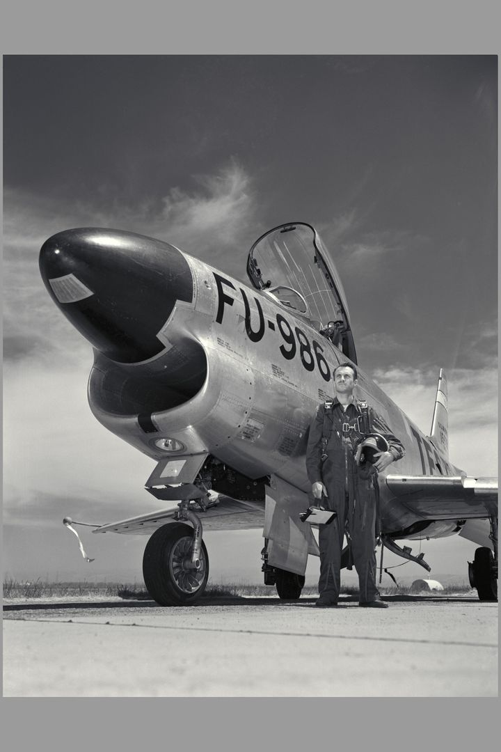 NACA Test Pilot Standing in Front of F-100 Super Sabre Jet - Free Images, Stock Photos and Pictures on Pikwizard.com