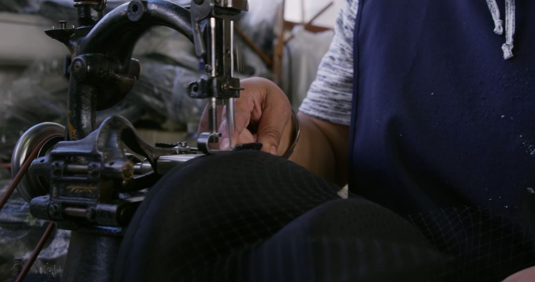 Tailor Working on Sewing Machine Close Up - Free Images, Stock Photos and Pictures on Pikwizard.com