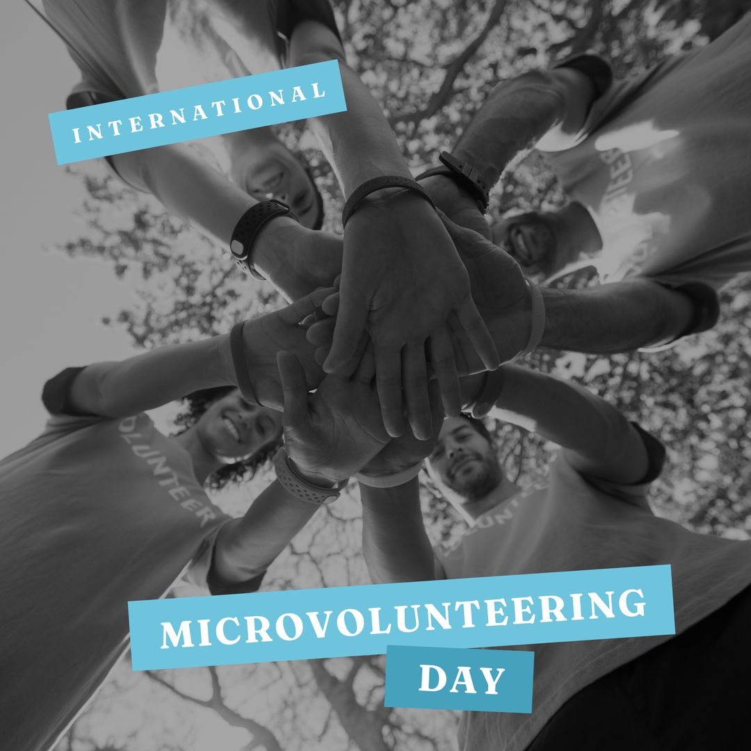 Diverse Volunteers Stacking Hands on International Microvolunteering Day