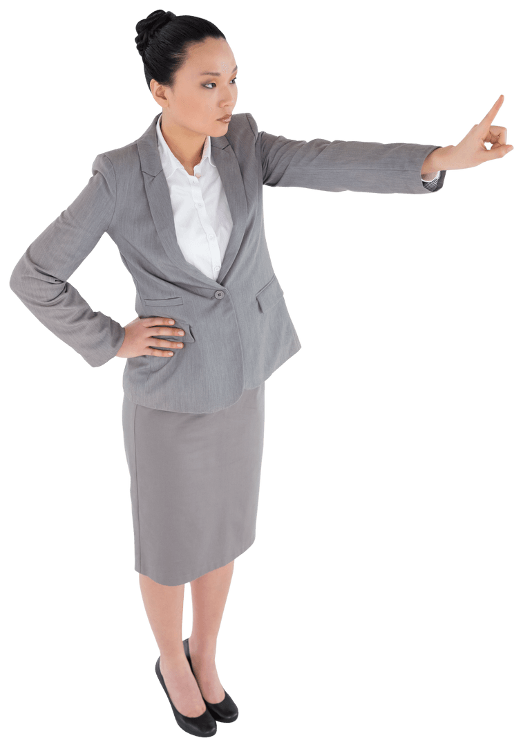 Focused Asian Businesswoman Pointing with Confidence on Transparent Background
