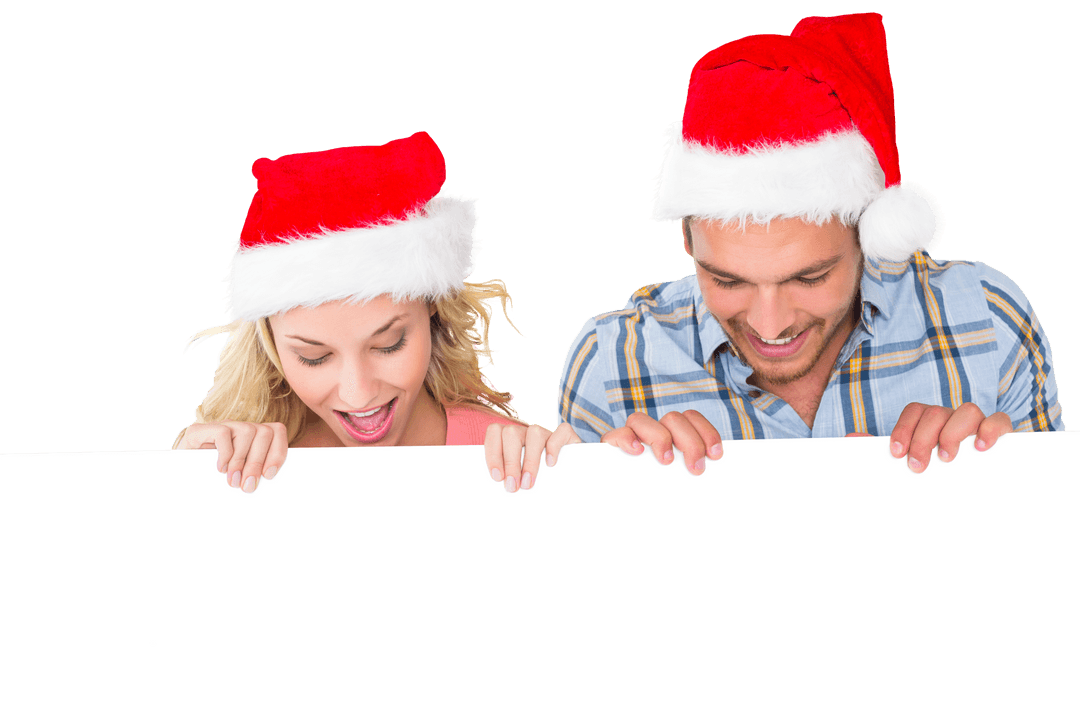 Joyful Couple in Santa Hats Peeking Behind Blank Board, Transparent Background